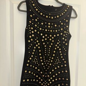 Beautiful unique black dressss with gold pendants